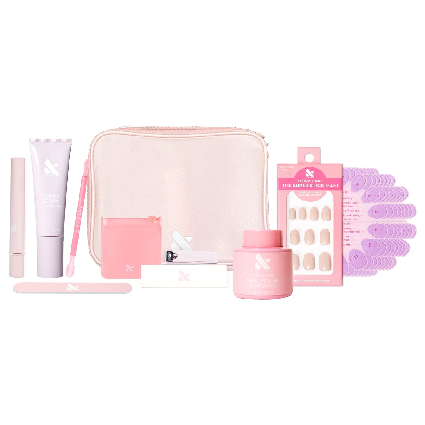 Tab Press-On System - 4 Sets with manicure tools, press-on nails, nail polish remover, and pink carrying case on white background