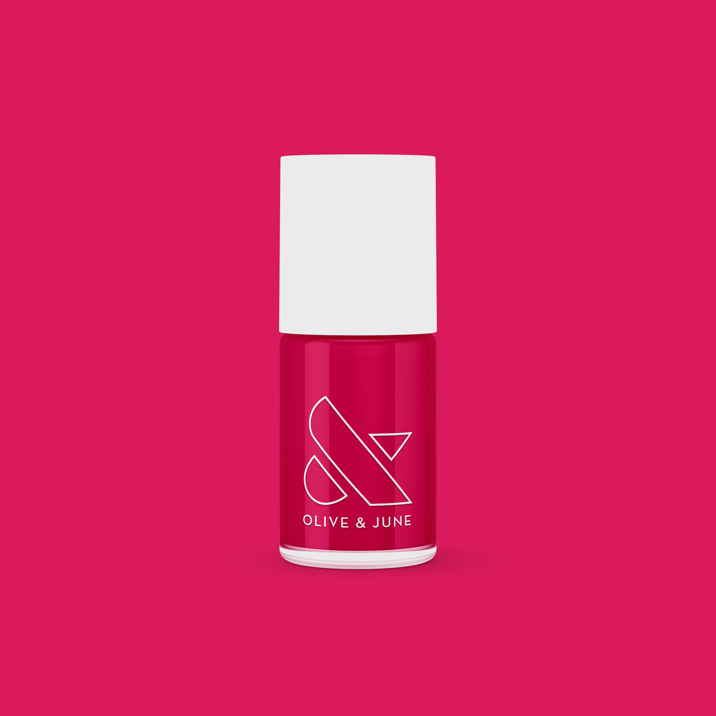 XOXO nail polish bottle in bright hot pink shade on matching pink background for vibrant manicure looks