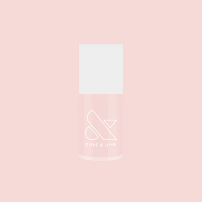 Brave Blush pastel pink nail polish bottle by Olive and June for a smooth, long-lasting at-home manicure or pedicure