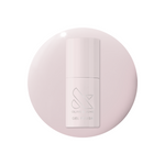 Sculpture Wing - Gel polish bottle on a smooth lavender neutral grey background for mani or pedicure use