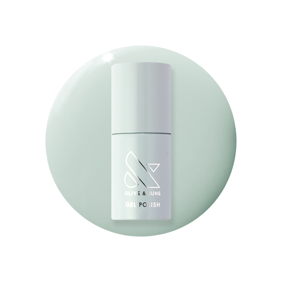 KMC - Gel bottle displayed on a soft sage green background representing a long-lasting gel polish by Olive and June