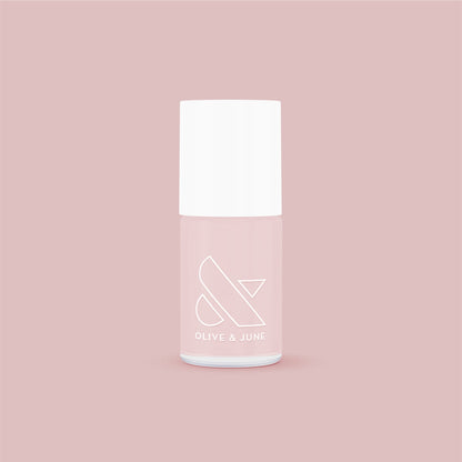 Olive and June nail polish bottle in soft neutral mauve shade The Queen Takes her Tea with Milk for elegant mani at home