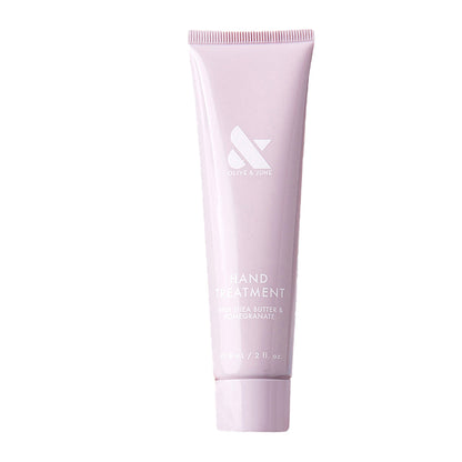 Pink tube of HAND TREATMENT with shea butter and pomegranate for hydrating and renewing dry skin and nails