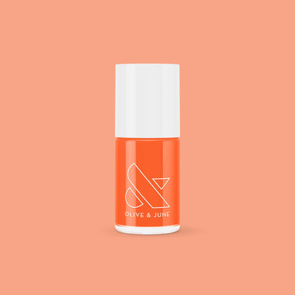 You're a 10 gel polish bottle in vibrant tangerine shade on matching orange background for bold mani looks
